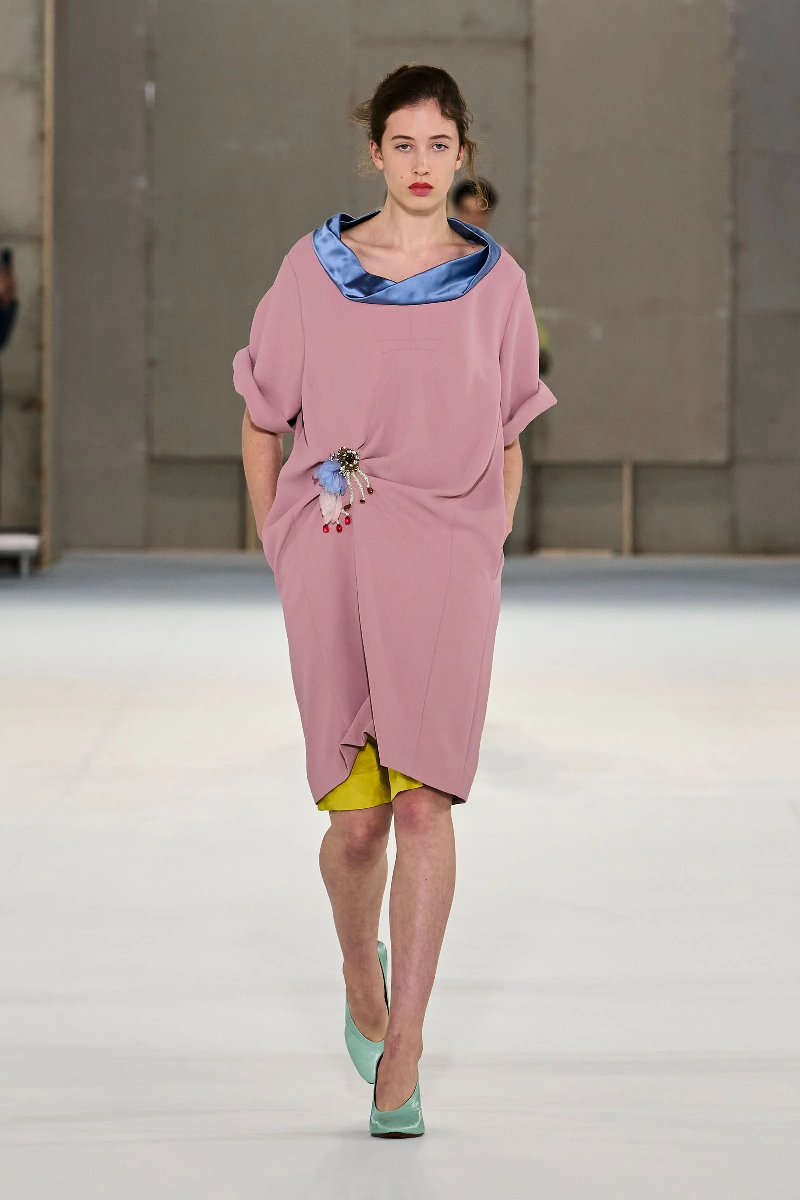 Image may contain Fashion Adult Person Clothing Sleeve and Runway